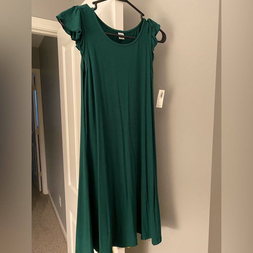 XS flutter sleeve swing dress. NWT. Fits like a small.